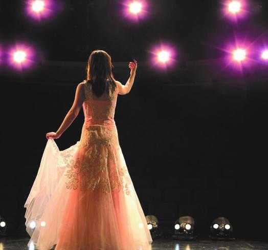 Woman performing on stage