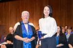 Young Su Kim accepting her Private Teacher - Strings teaching award from Lyn Morgan