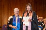 Leonie Hunter receiving her LMusA from federal examiner Lyn Morgan